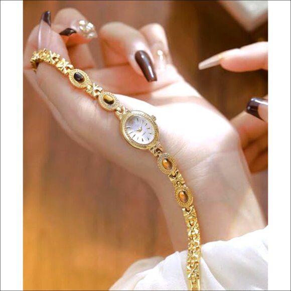 Women\'s Oval Dial Gold Bracelet Watch Quartz Movement Water Resistant